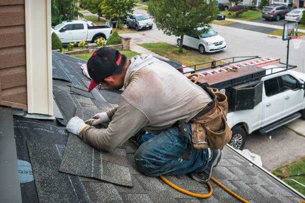 Professional Roofing technician working in Albion, MI